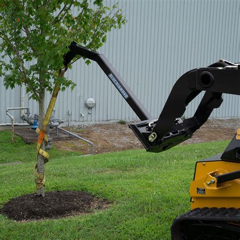 skid steer using tree boom|skid steer tree trimming attachment.